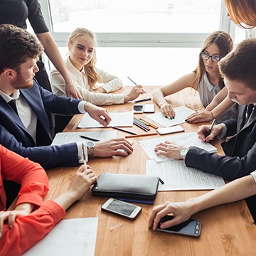people working at a desk
