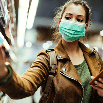 woman wearing mask at grocery store