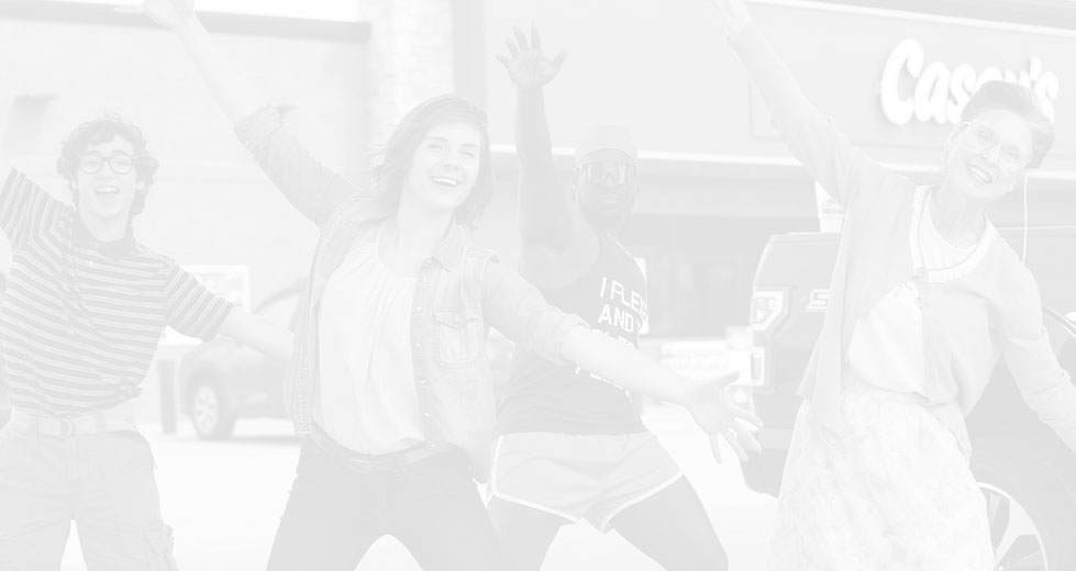 Photo of smiling people in a fun pose