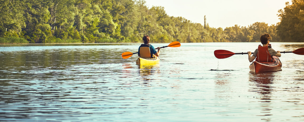 WI corn hero image of two people in kayaks in a river