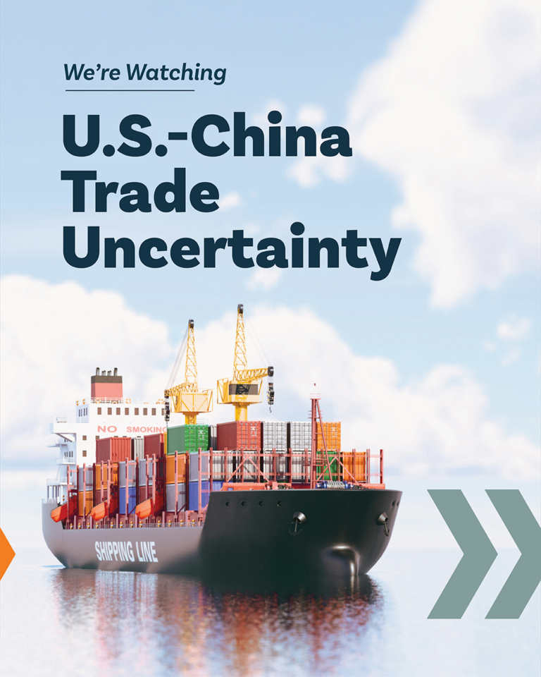 A cargo ship on the ocean with MorganMyers iconography. The title is We're Watching and the subtitle is U.S.-China Trade Uncertainty